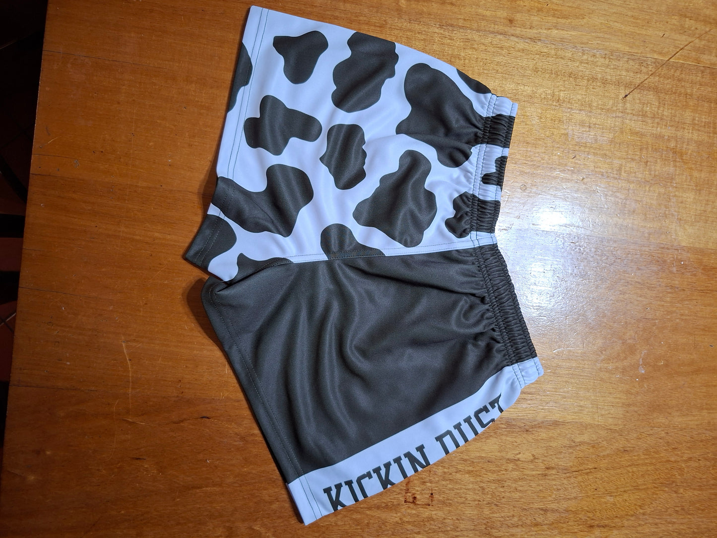 footy shorts cow print Kickin Dust