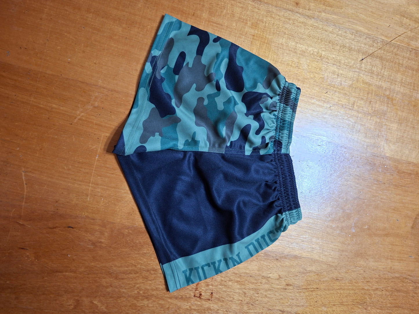 footy shorts camo green kickin dust