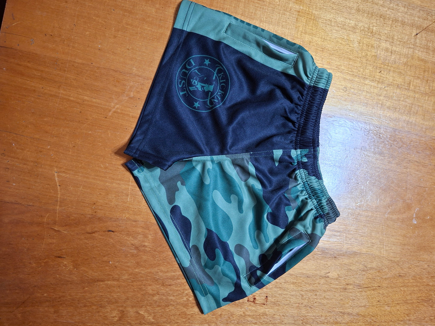 footy shorts kids camo kickin dust