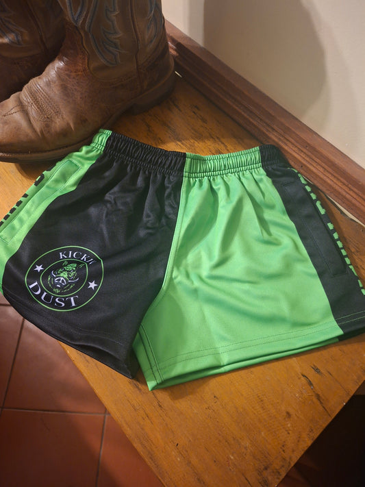 kids kickin dust footy shorts green pig