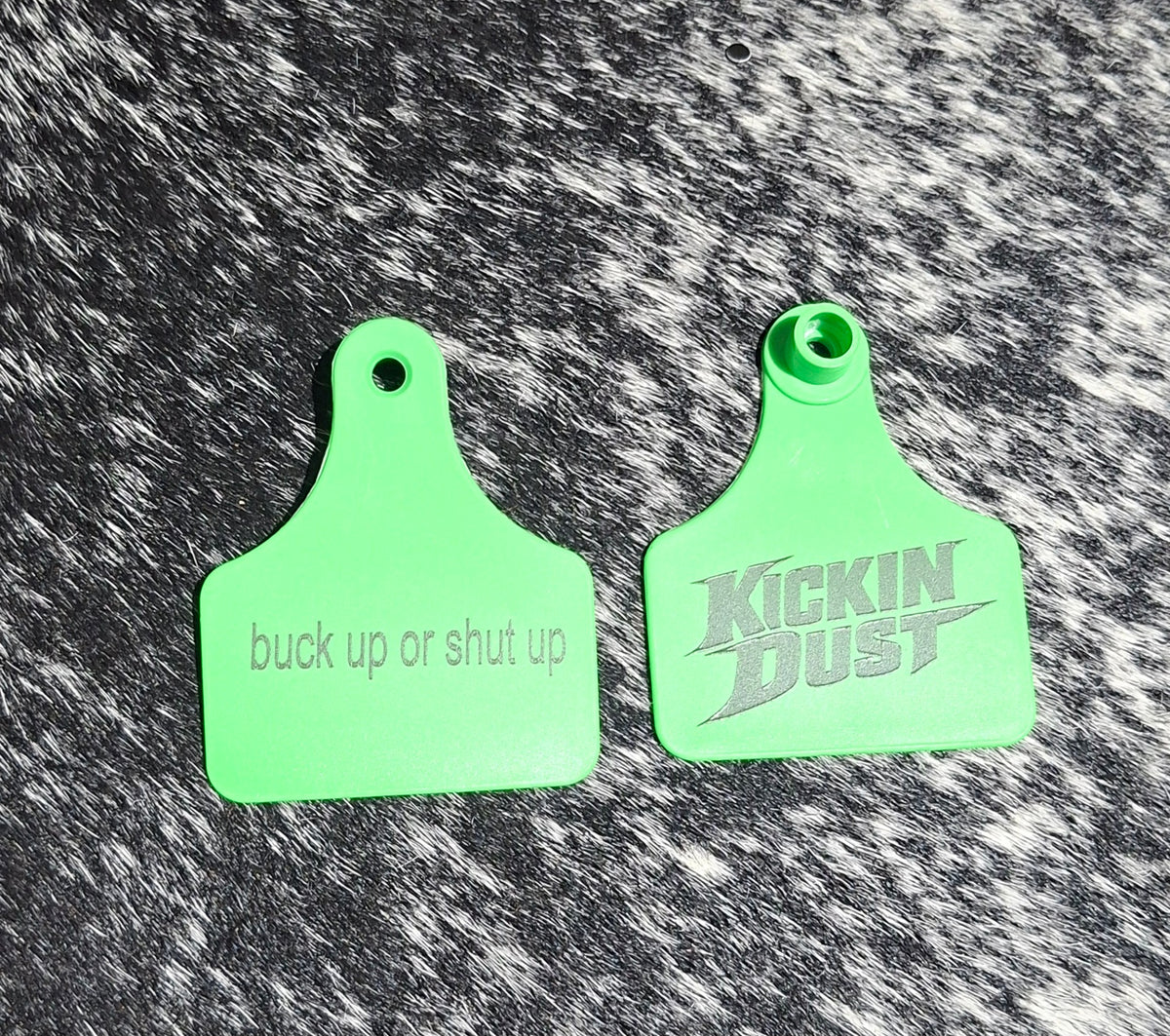 kickin dust ear tag ( buck up or shut up )